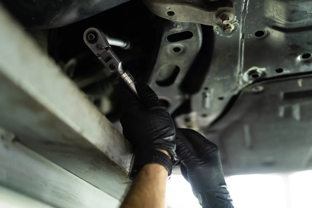 Mechanic working on a vehicle at the RWC HUB workshop in Yeerongpilly